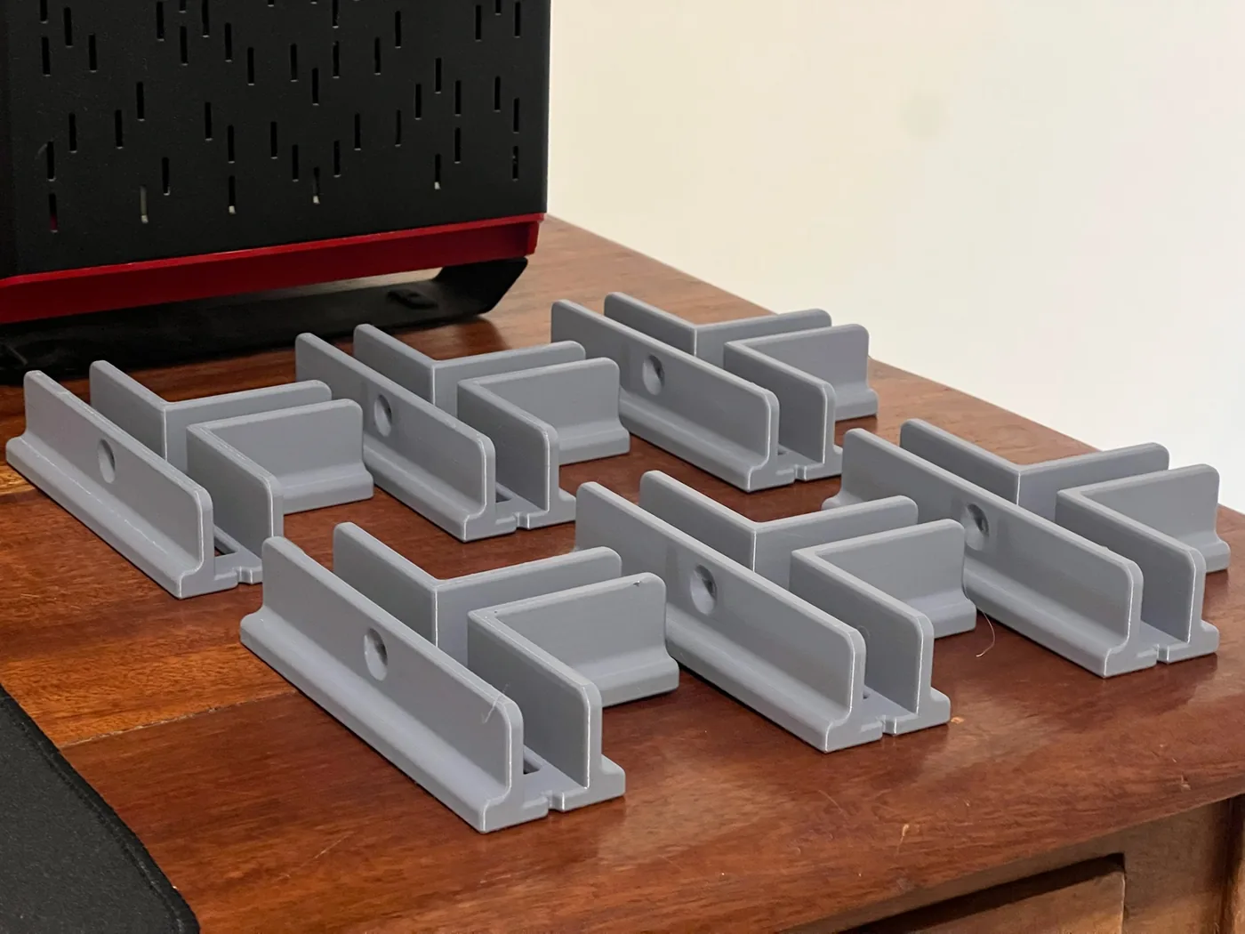 Batch of 3D printed stands produced by Layerzim